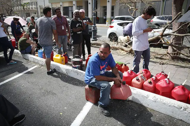 Edgar Morales sits and waits in line to get gas as he deals with the aftermath of Hurricane Maria on September 26, 2017 in San Juan Puerto Rico.